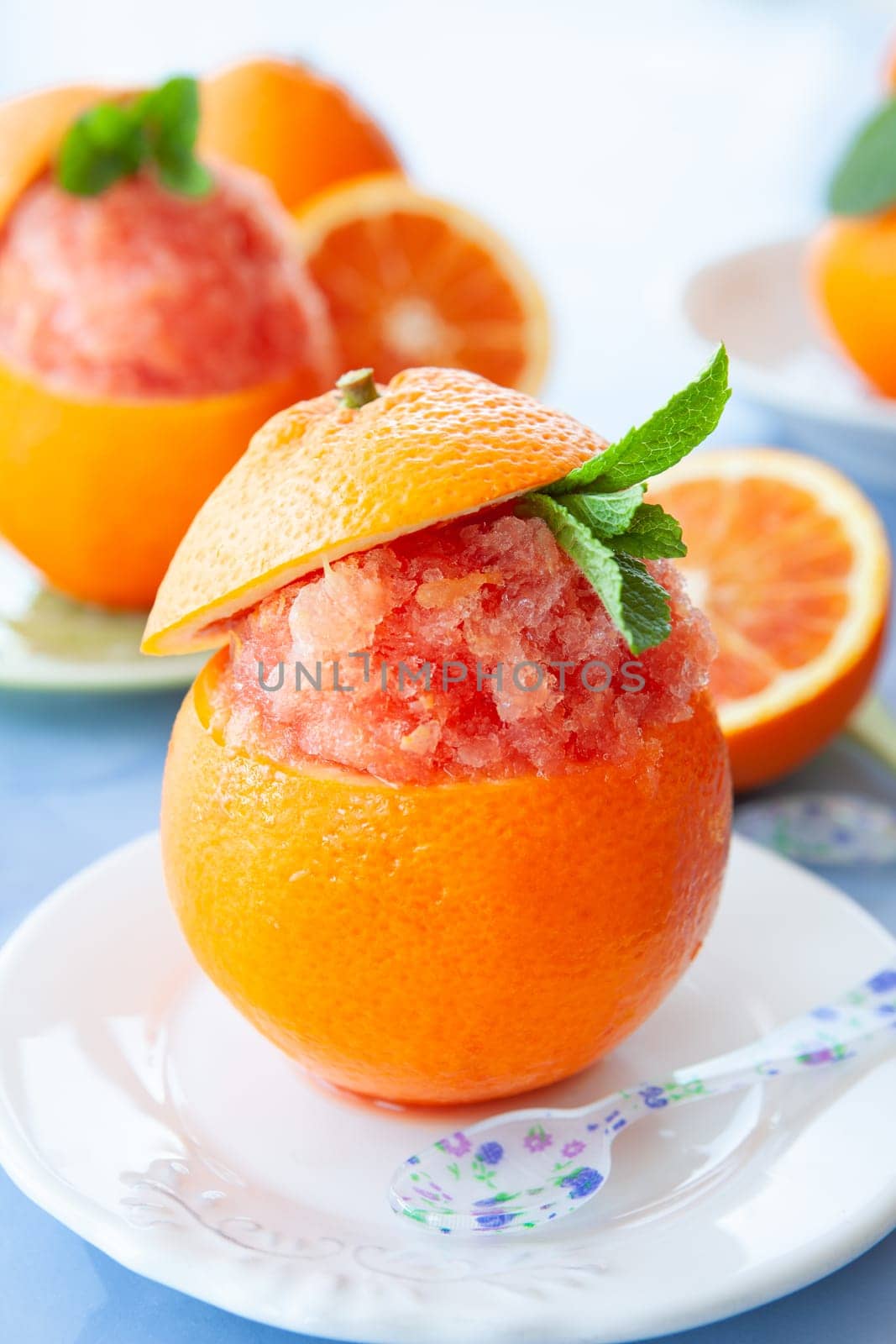 Refreshing orange sorbet served in a fresh blood orange