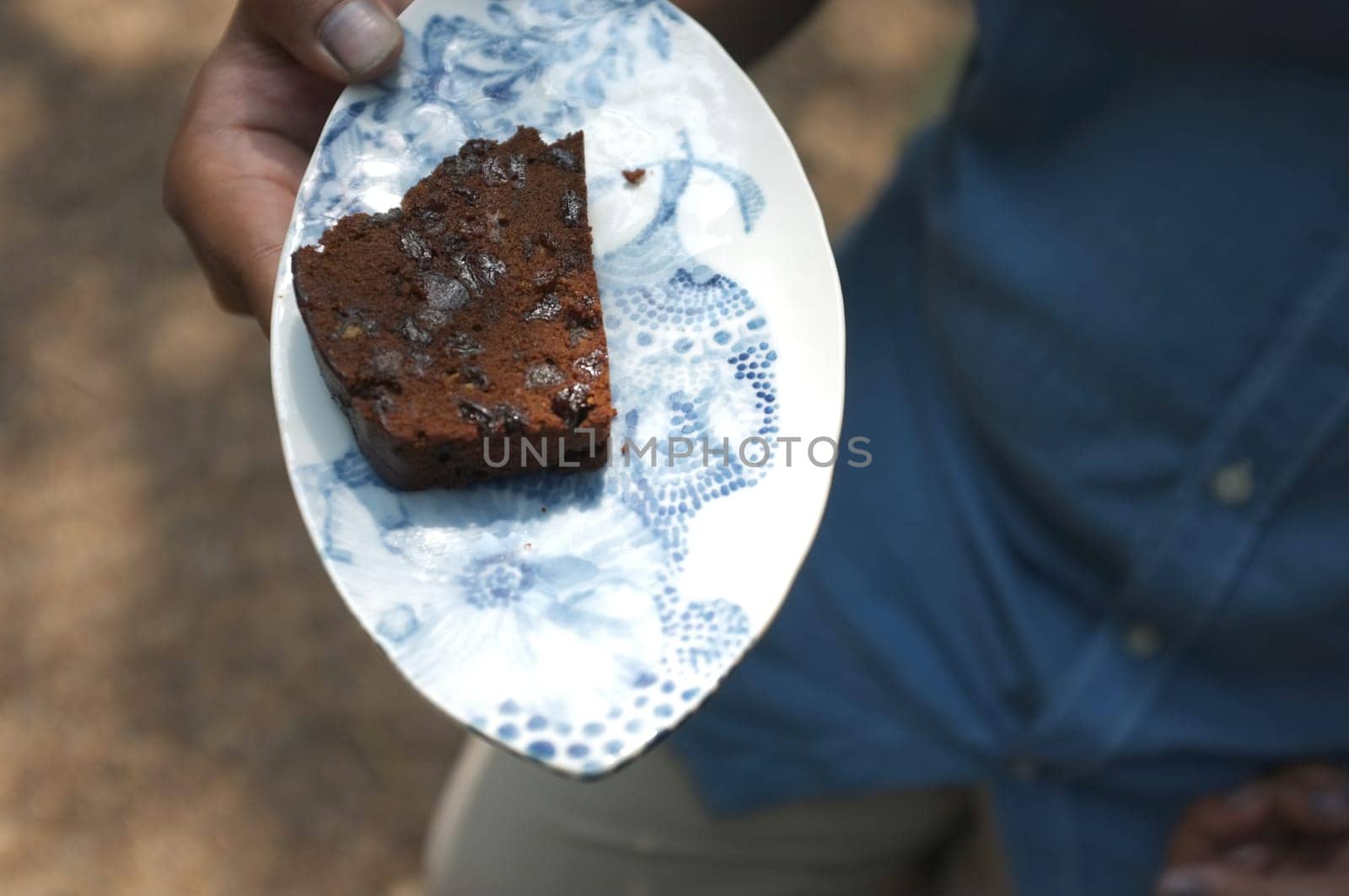 Messy yummy chocolate bun or Chocolate 'dirty' bread  in white box .