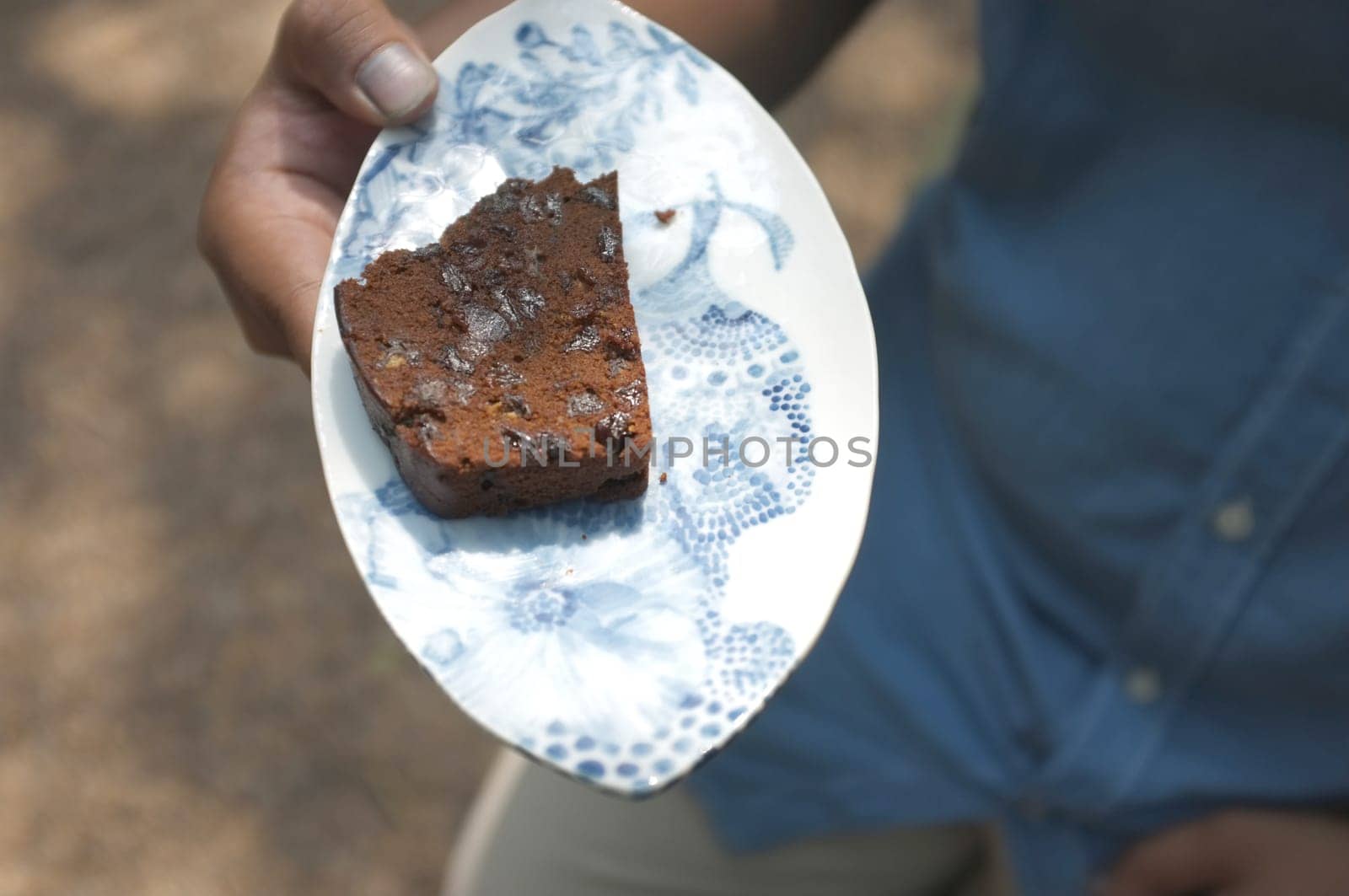 Messy yummy chocolate bun or Chocolate 'dirty' bread  in white box .
