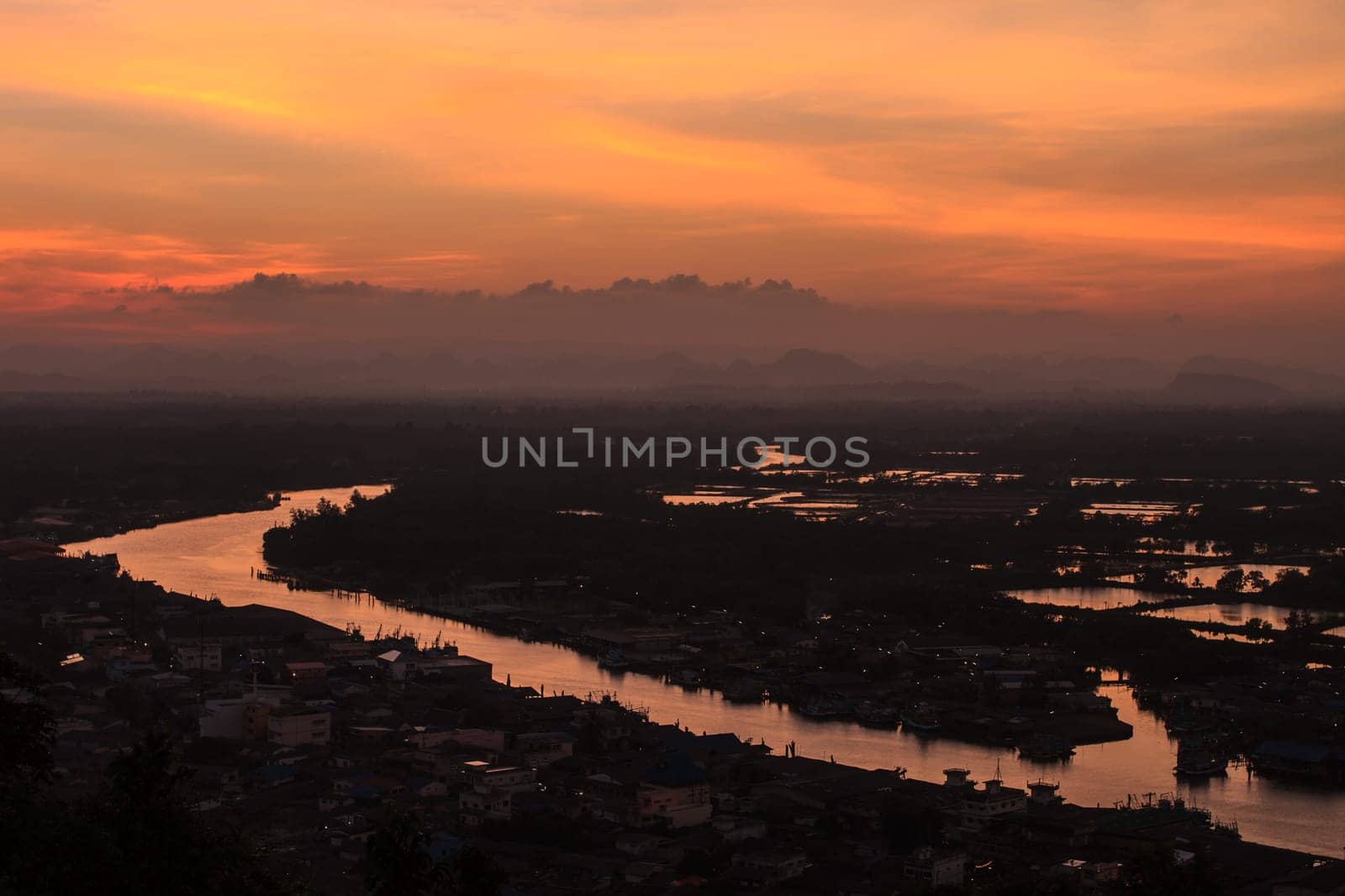 Beautiful fishing villages near mountain and sunset