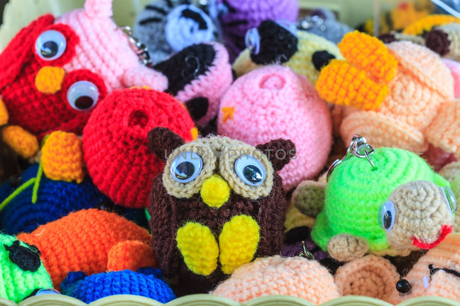 Crochet doll handmade art and crafts closeup, handmade crochet doll owl