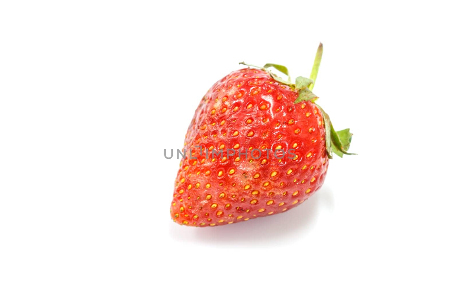 Ripe red strawberries on white background isolated