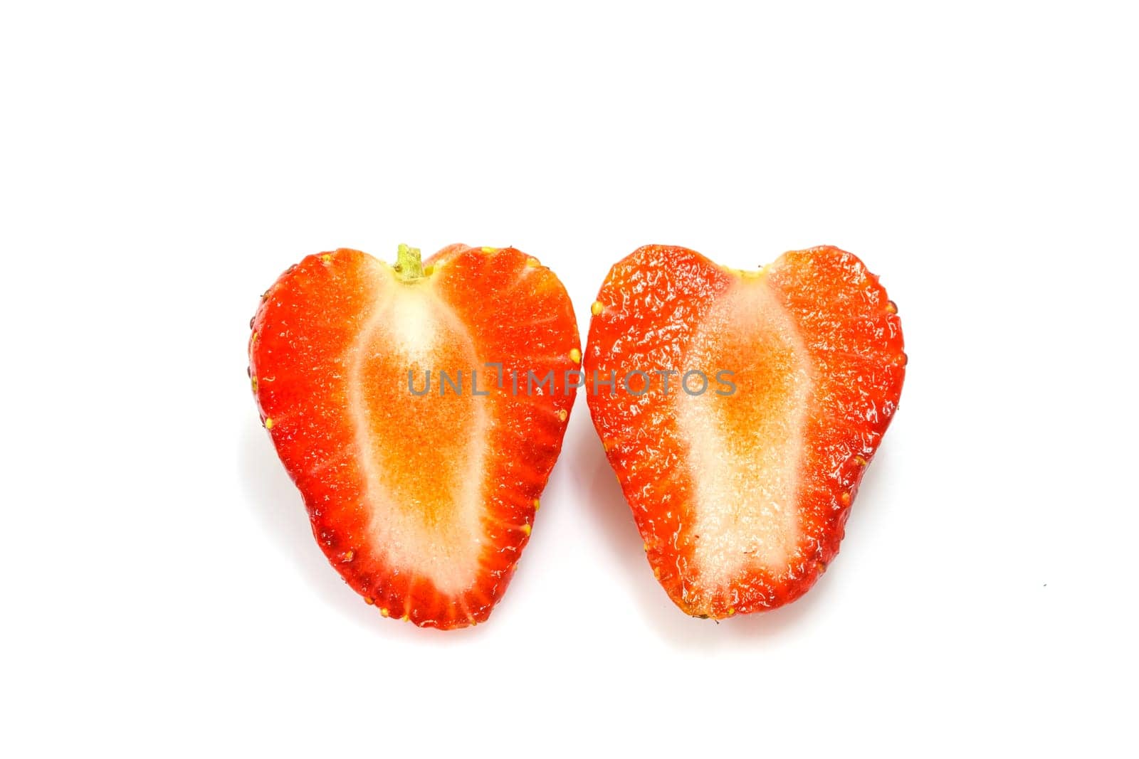 Ripe red strawberries on white background isolated