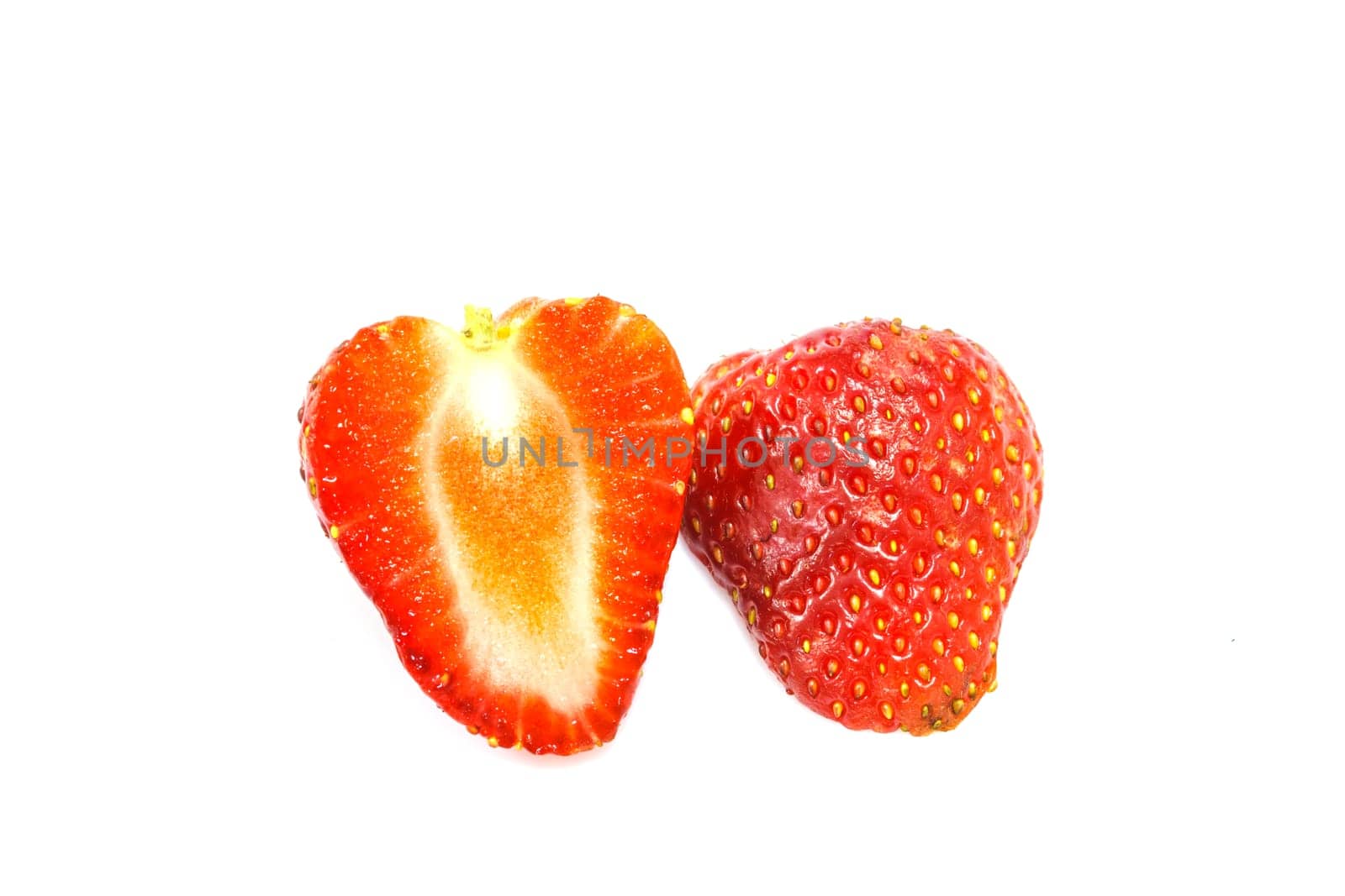 Ripe red strawberries on white background isolated