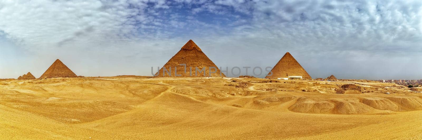 Panorama of the Giza Pyramids in the desert, Egypt.