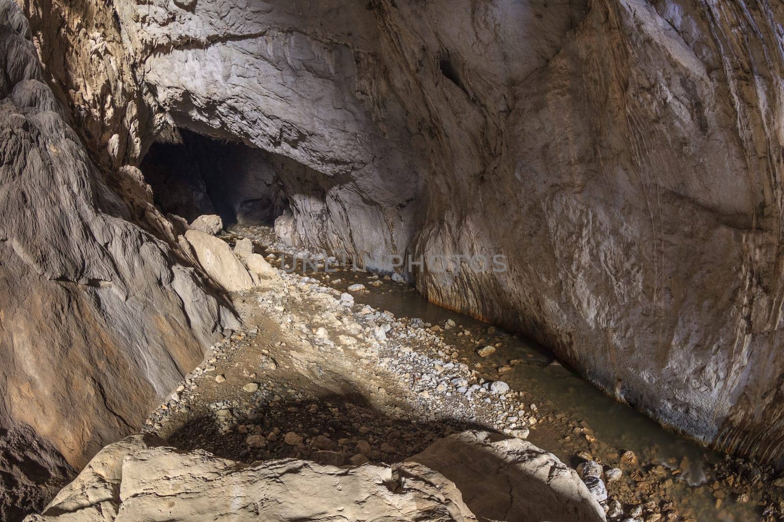 Ponicova cave entrance in the left bank of the Danube in Ciucaru Mare Mountain, Romania