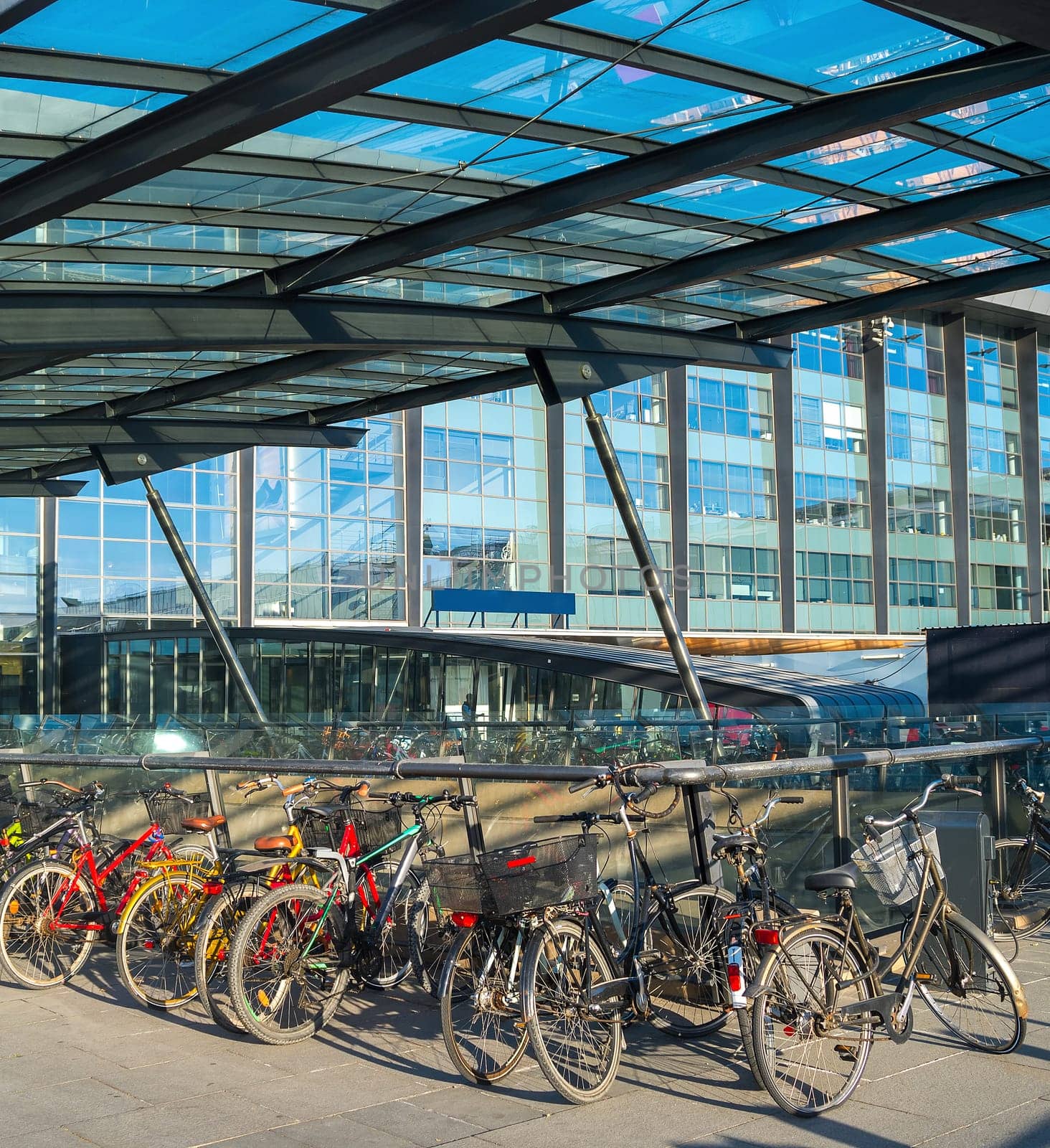Bicycles parking by the Kastrup airport at sunset, Copenhagen, Denmark