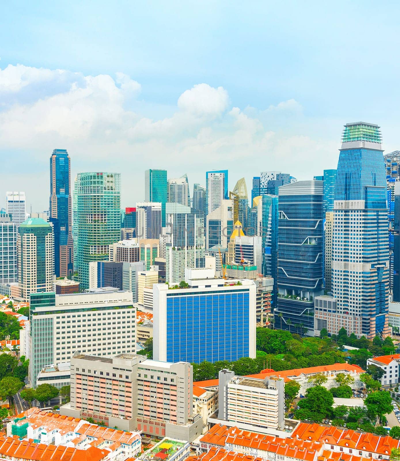 Aerial cityscape of Singapore modern downtown with chinatown district below