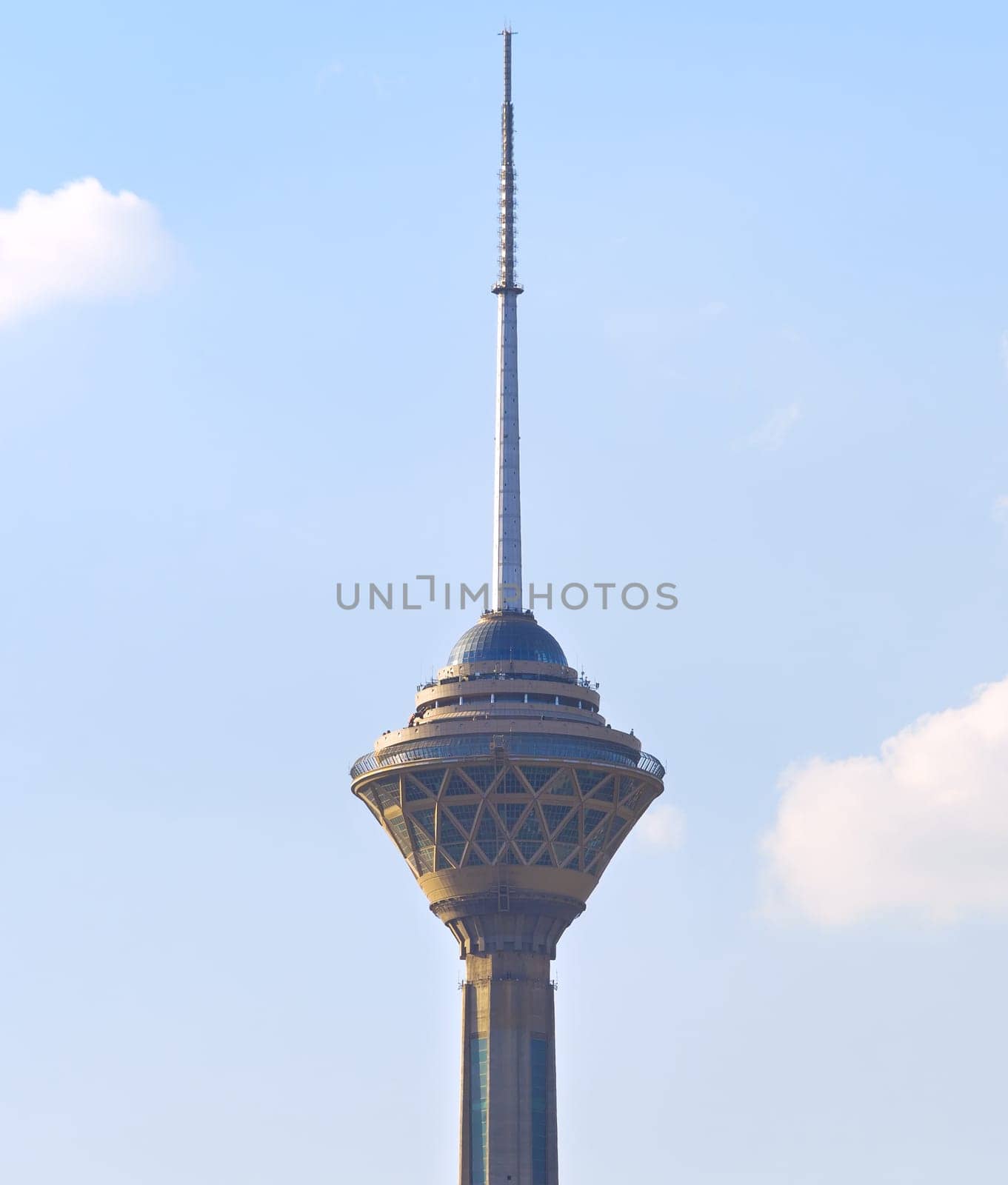 Milad Tower with blue sky and clouds in the dayime. Tehran, Iran