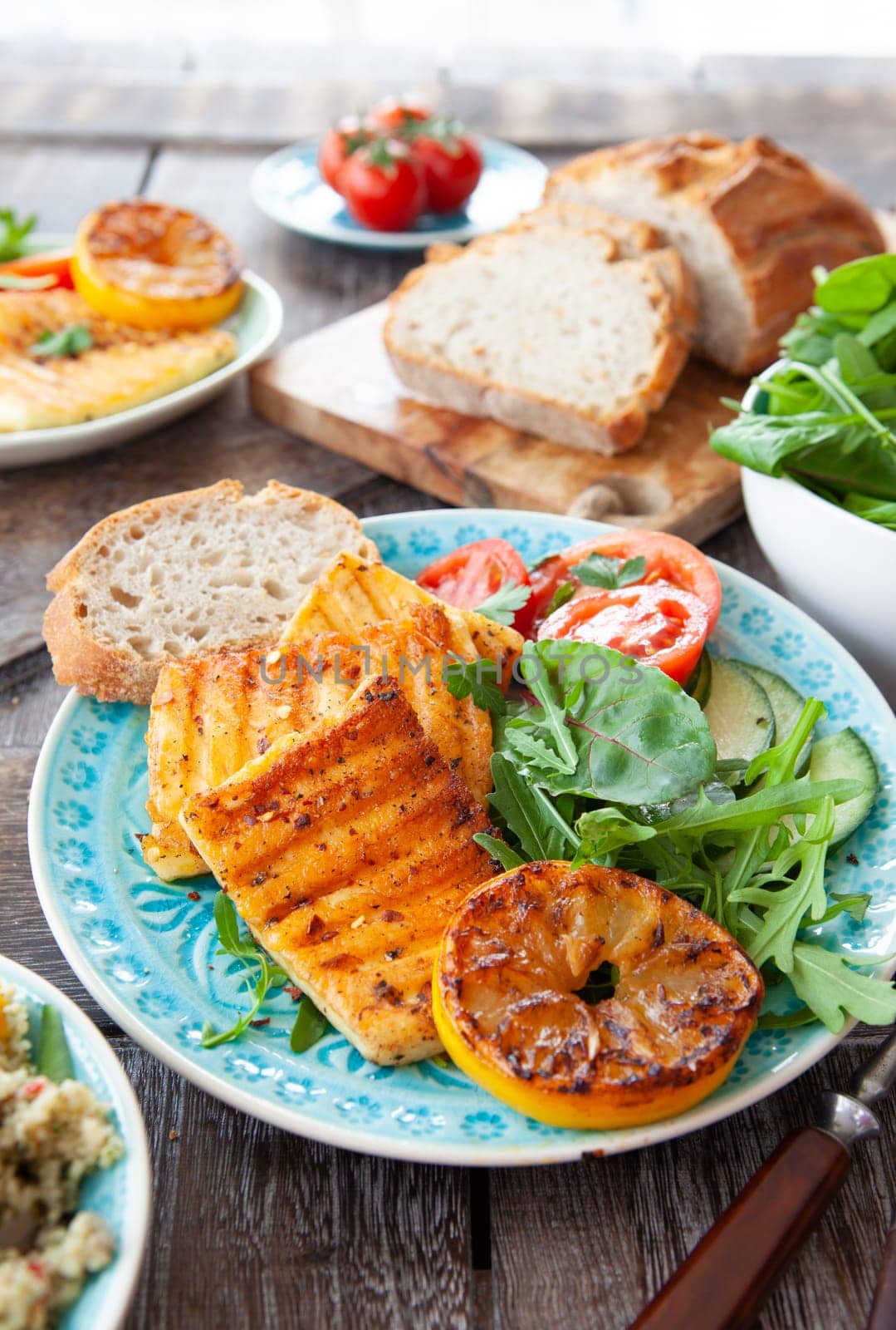 BBQ grilled cheese with fresh salad and bread