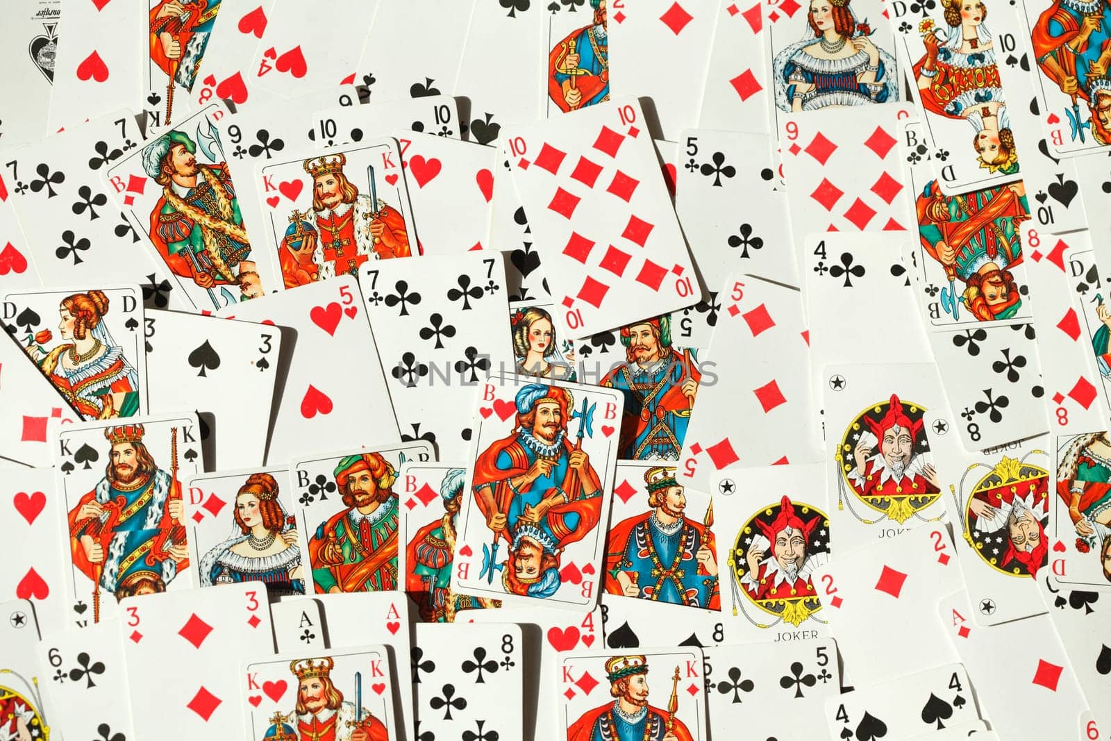 Various colorful playing cards, background picture, abstract