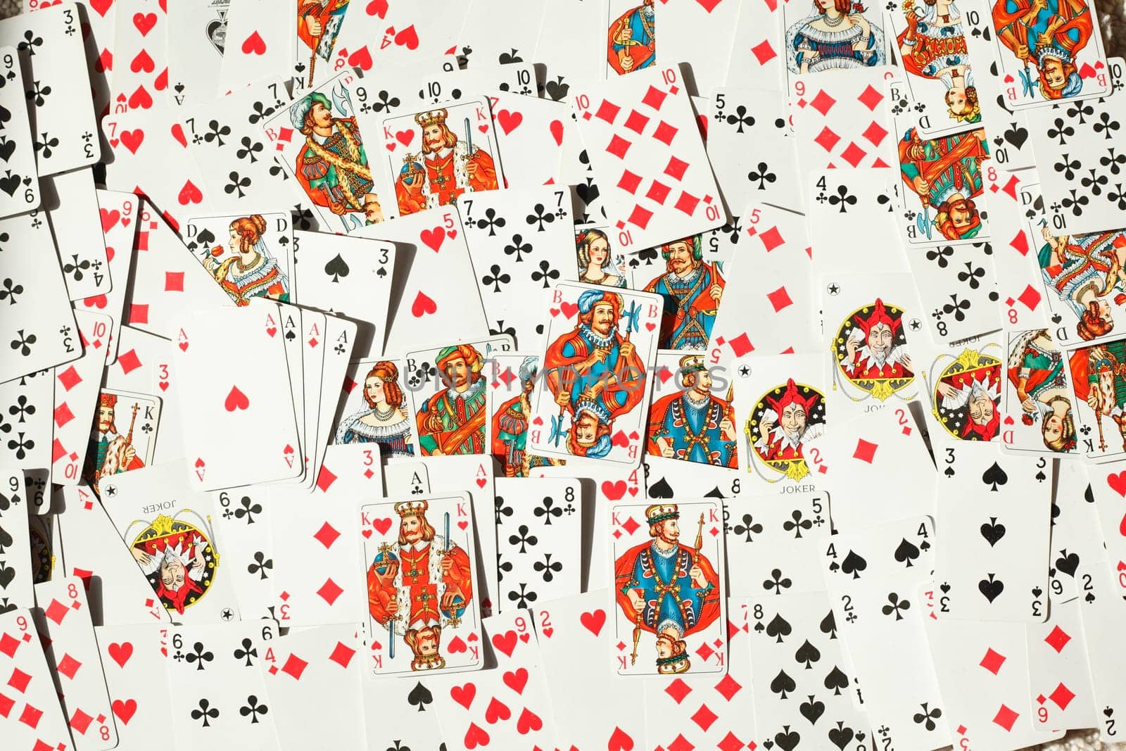 Various colorful playing cards, background picture, abstract
