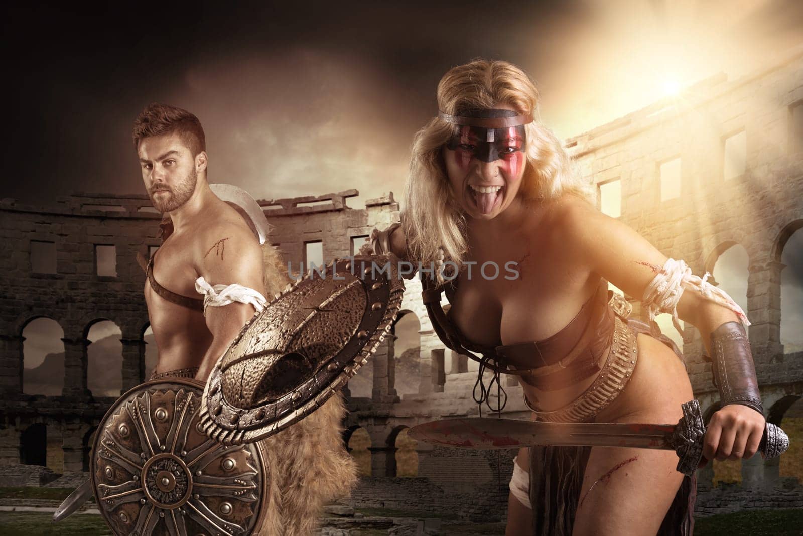 Ancient warrior or Gladiator's couple ready to fight in the arena