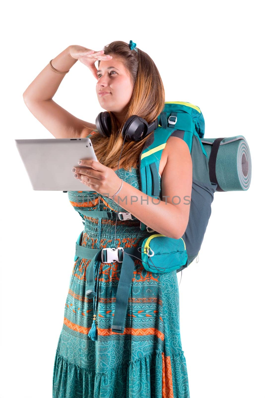 Hiker girl with tabletk isolated in white, trekking and travel lifestyle concept