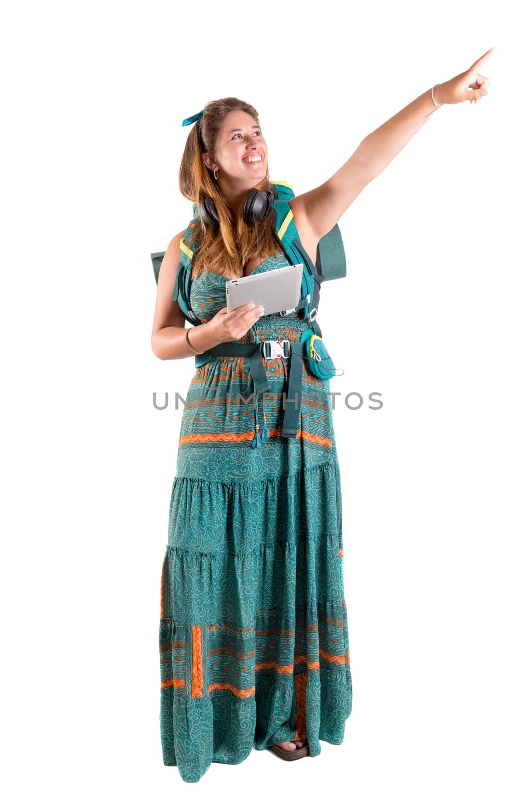 Hiker girl with tablet isolated in white, trekking and travel lifestyle concept