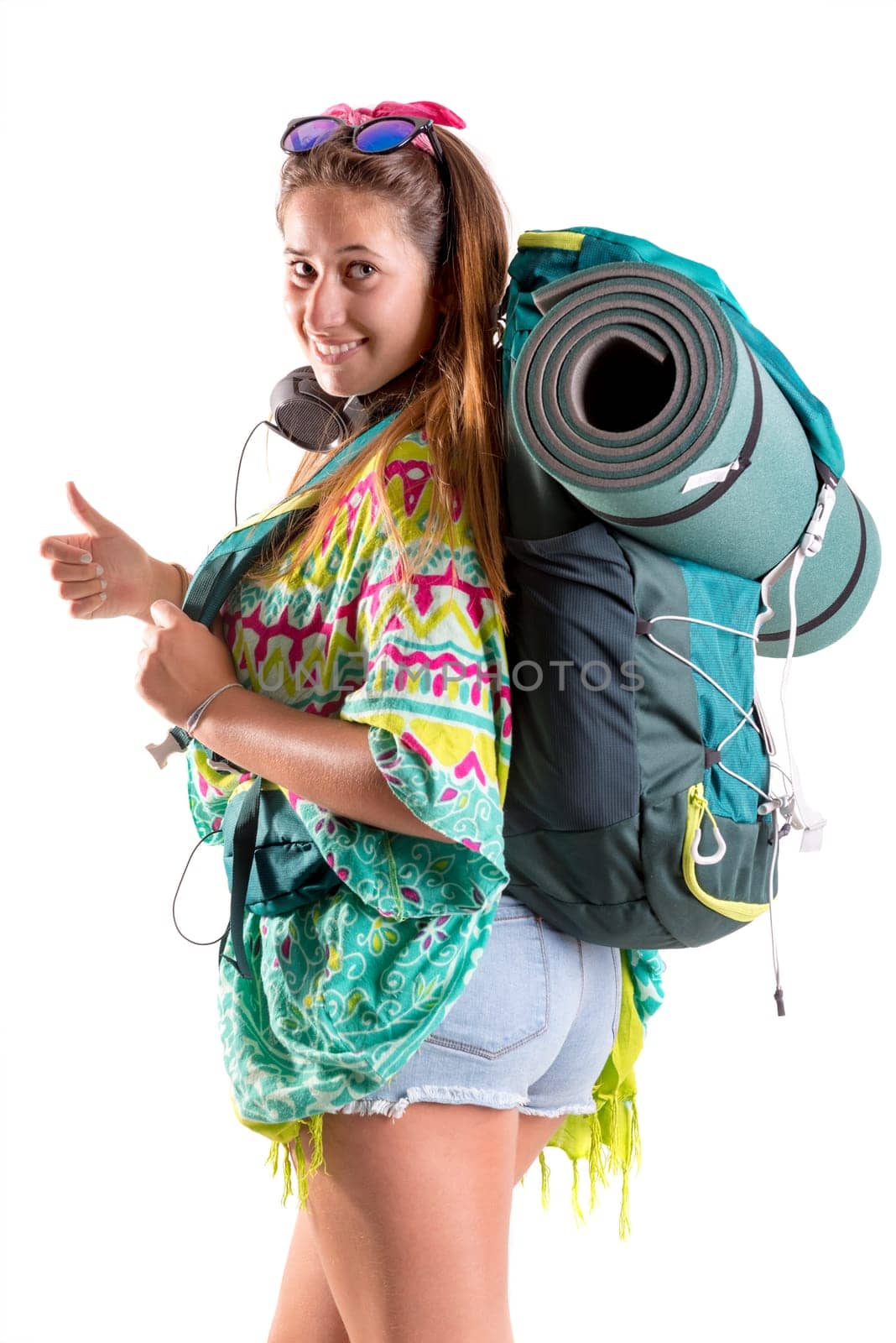 Happy hiker girl with backpack isolated in white, trekking and travel lifestyle concept