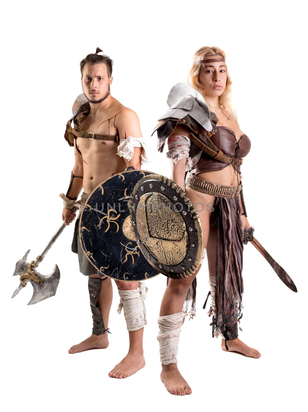 Ancient warrior or Gladiator couple posing in a white background