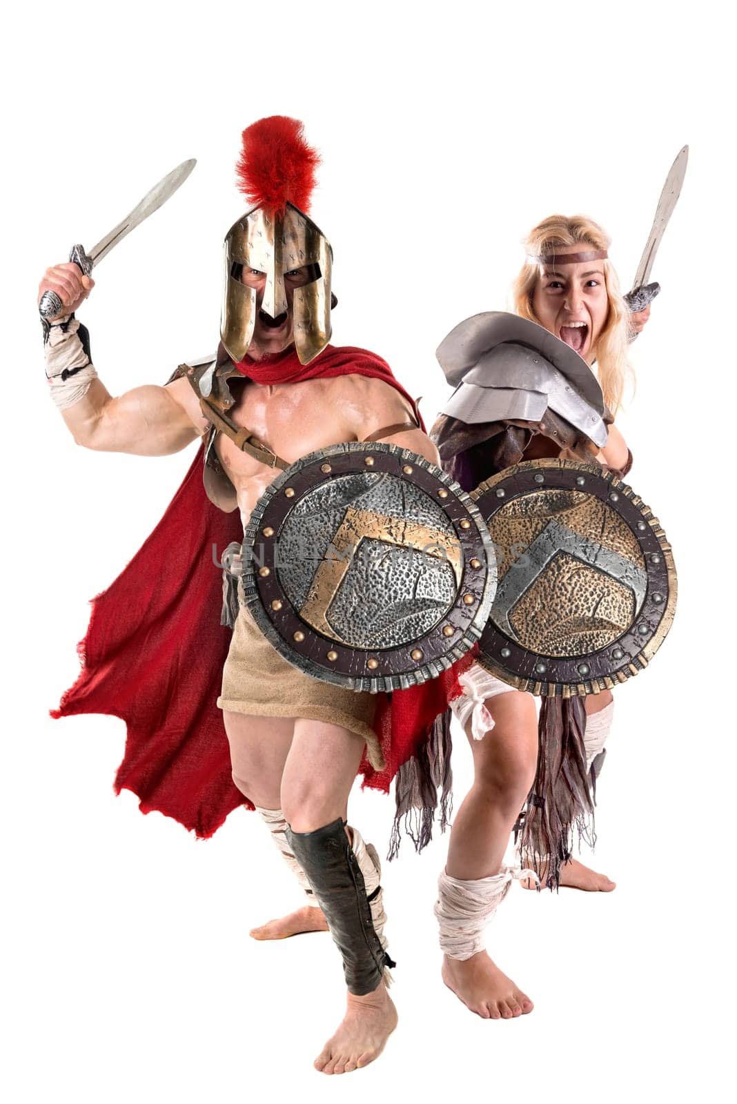 Ancient warrior or Gladiator couple posing in a white background