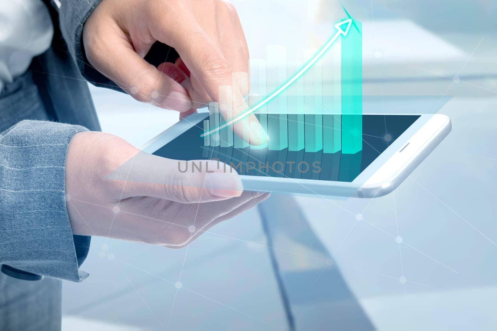 Business woman touch the digital tablet and display the interface of incrased graphs. Digital technology concept
