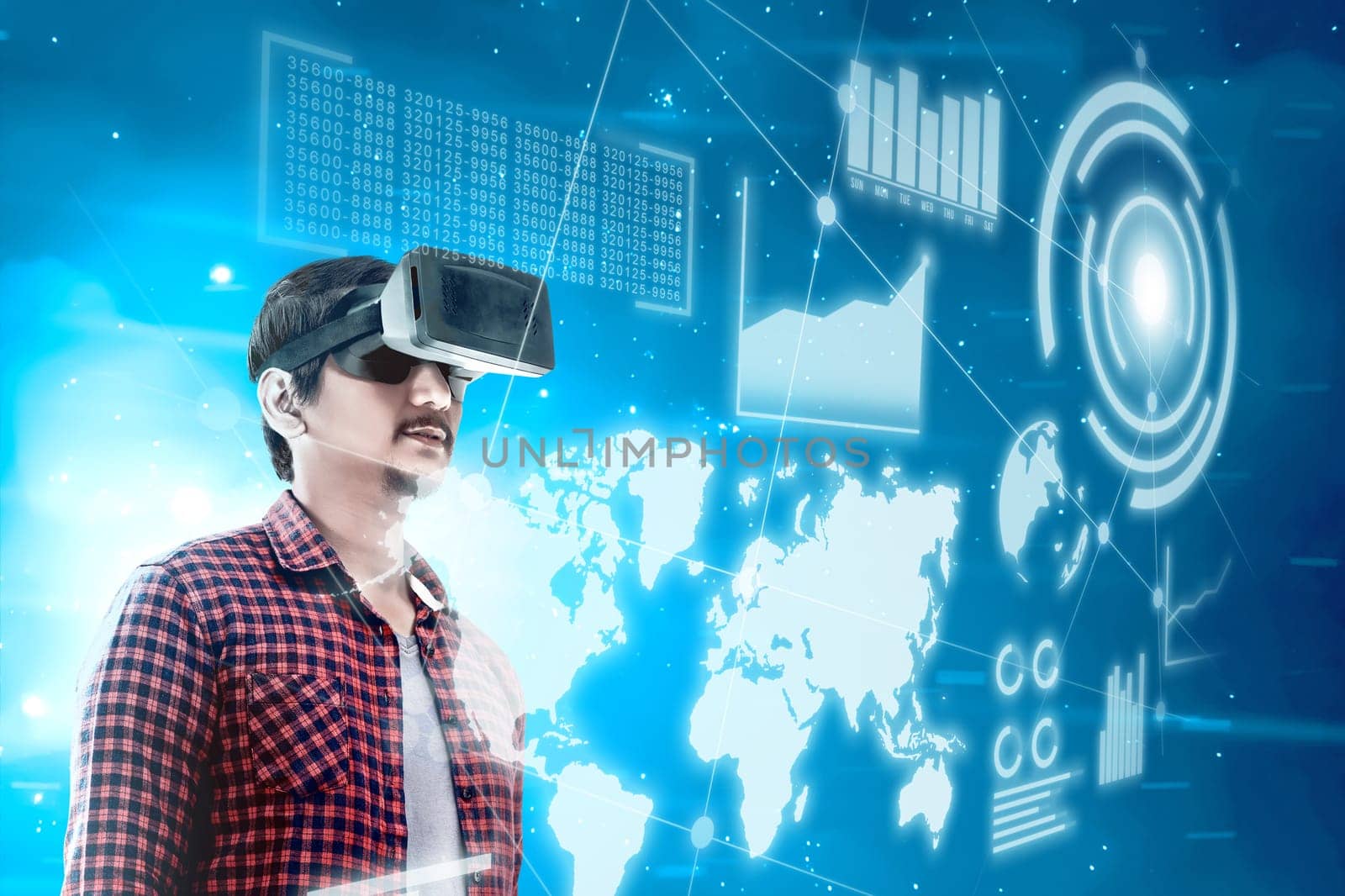 Asian man looking at digital interface with virtual reality device display the world map, graphic bar and binary code. Augmented reality technology