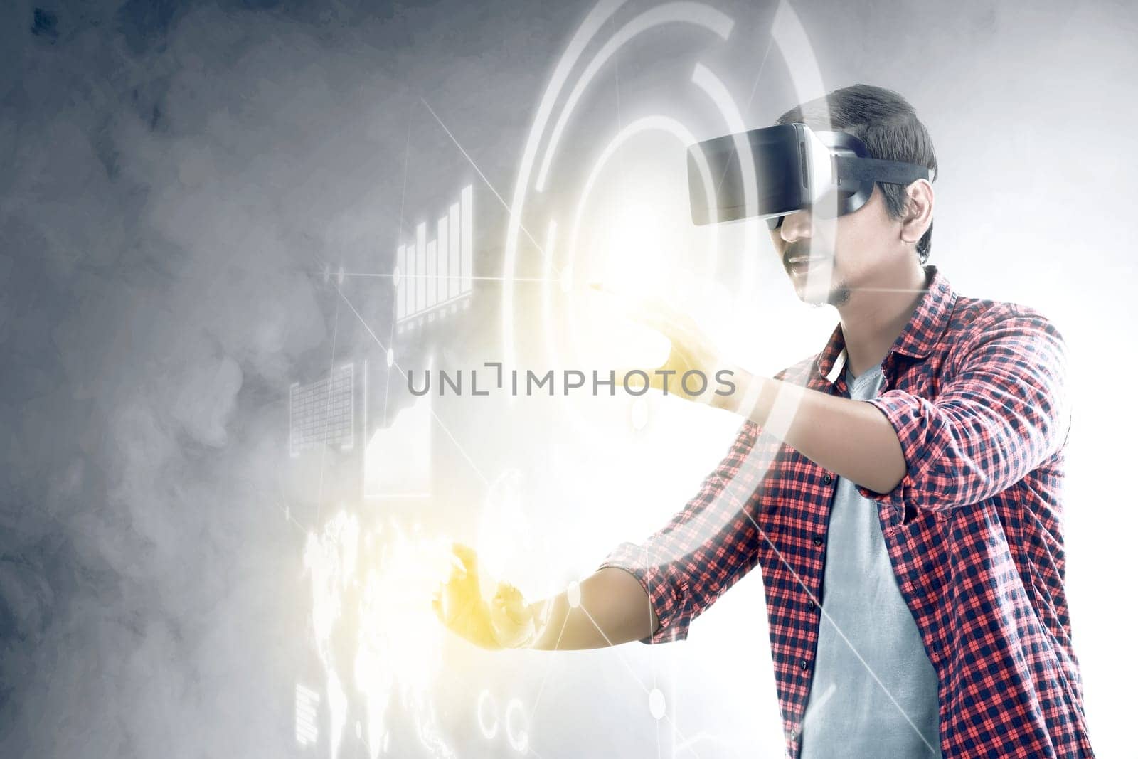 Asian man touching a circle and world map on digital interface with virtual reality device display the world map, graphic bar and binary code. Augmented reality technology