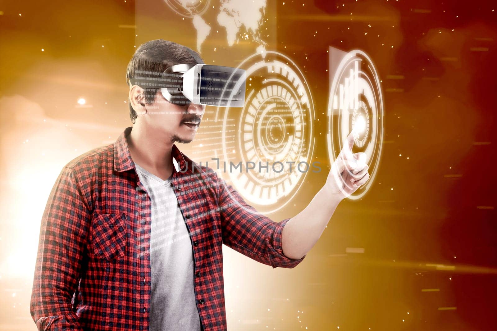 Asian man touching a circle on digital interface with virtual reality device display the world map and binary code. Augmented reality technology