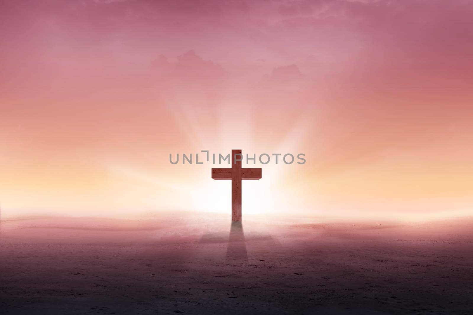 Christian cross on the desert with sun rays over sunrise background
