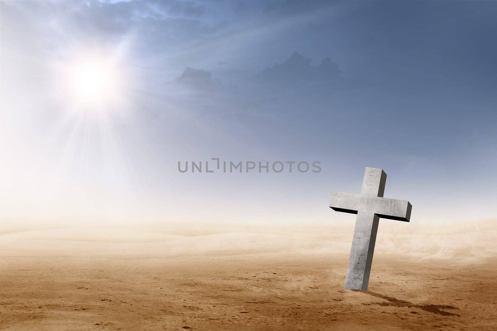Christian cross on the desert with sun rays over dark sky background