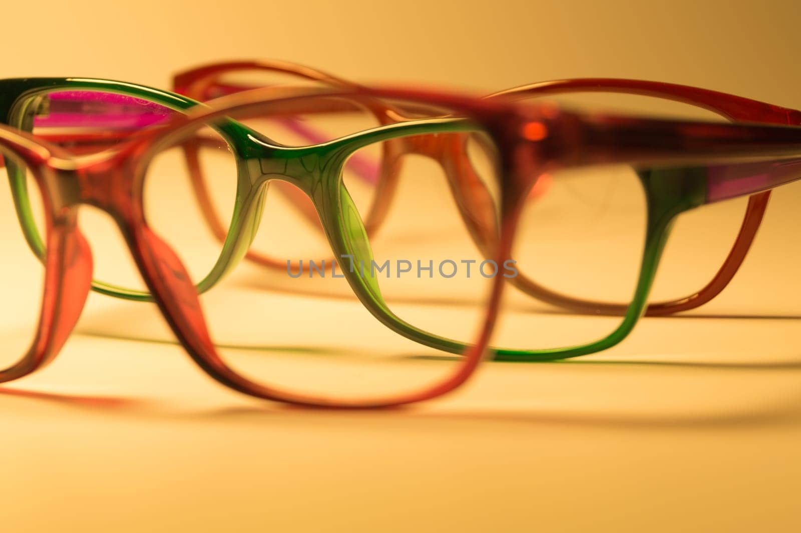 Rimmed eyeglasses closeup on a white background abstract view