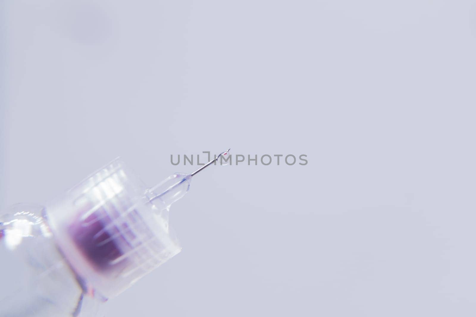 Diabetes syringe with needle closeup