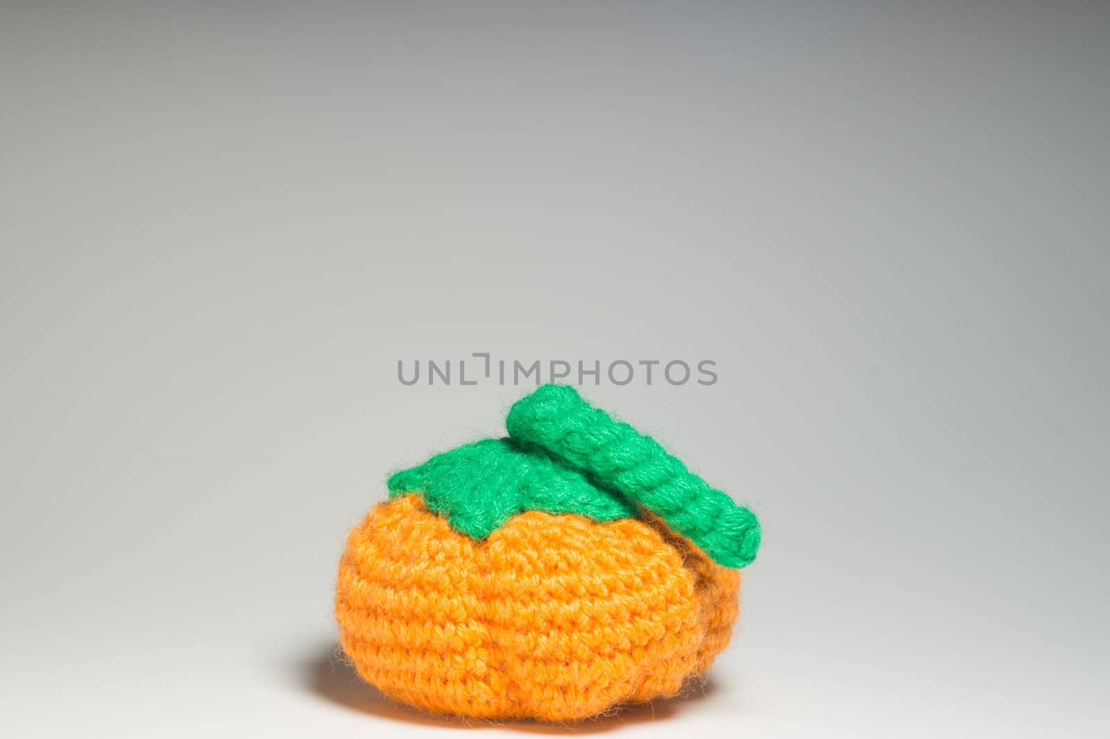 Handmade knitting wool texture background closeup needlework. healthy food concept