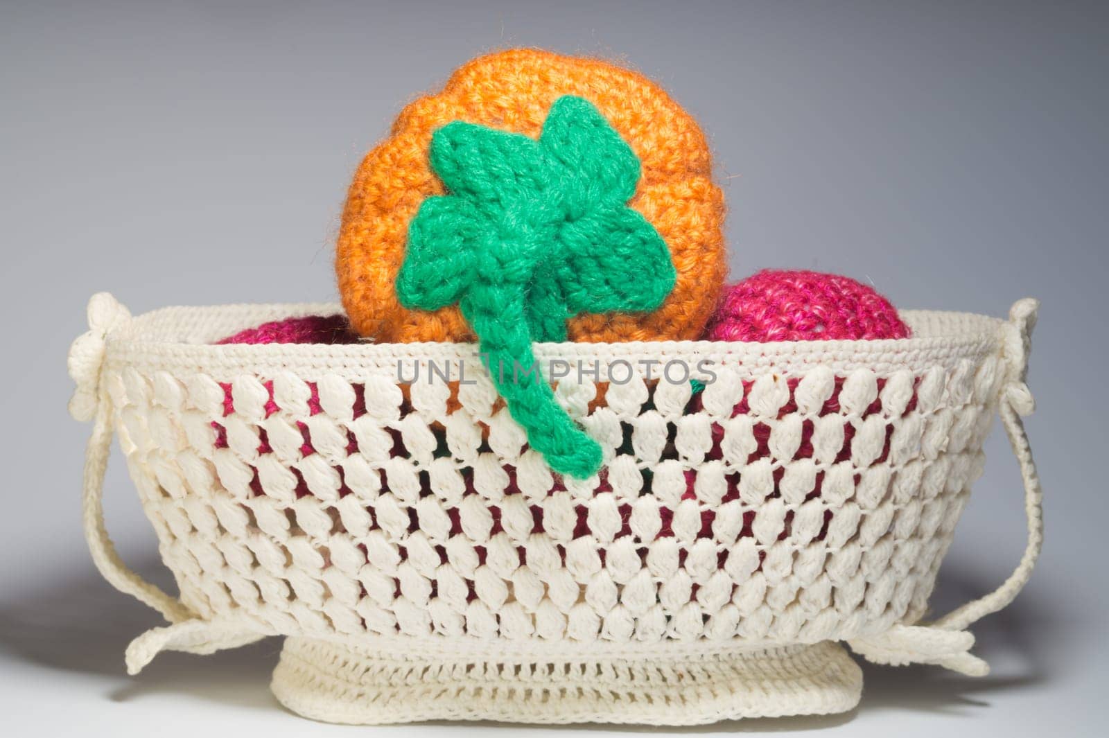 Handmade knitting wool texture background closeup needlework. healthy food concept