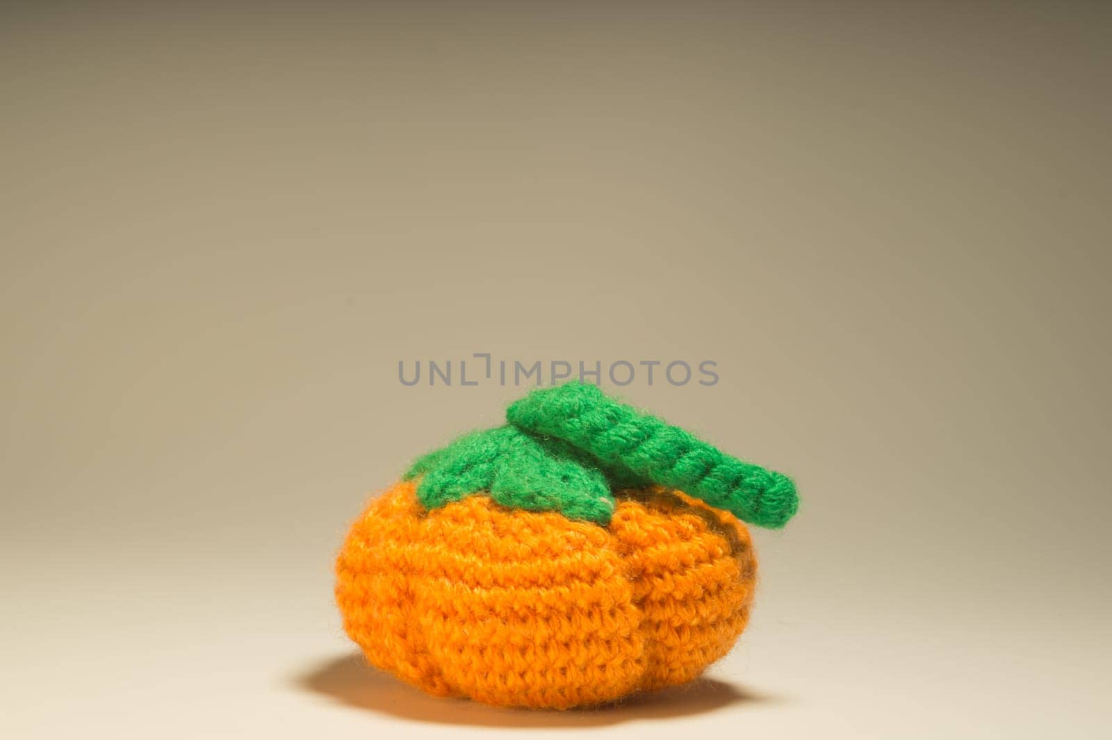 Handmade knitting wool texture background closeup needlework. healthy food concept