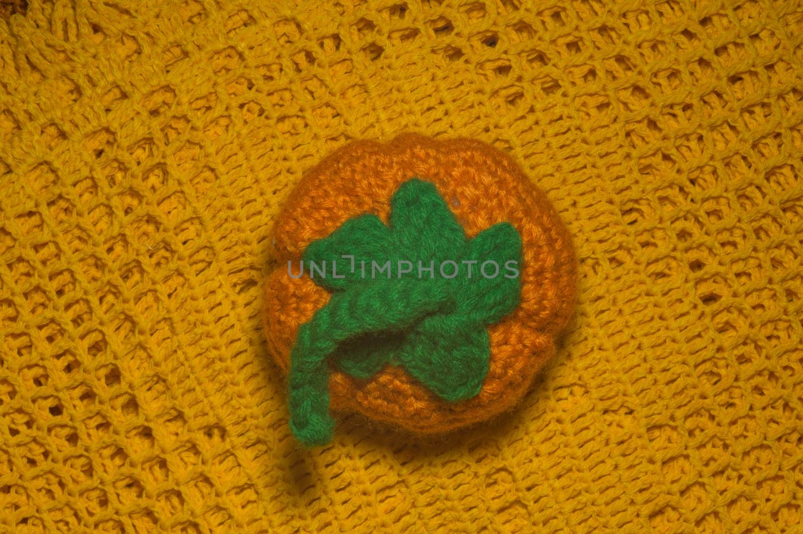 Handmade knitting wool texture background closeup needlework. healthy food concept