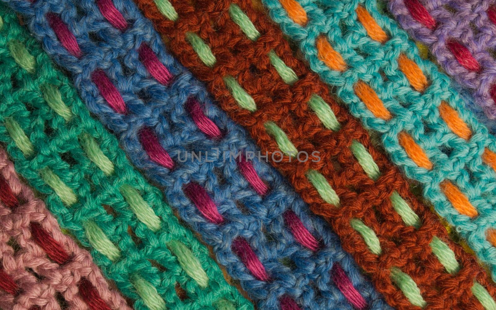 Handmade knitting wool texture background closeup needlework. healthy food concept