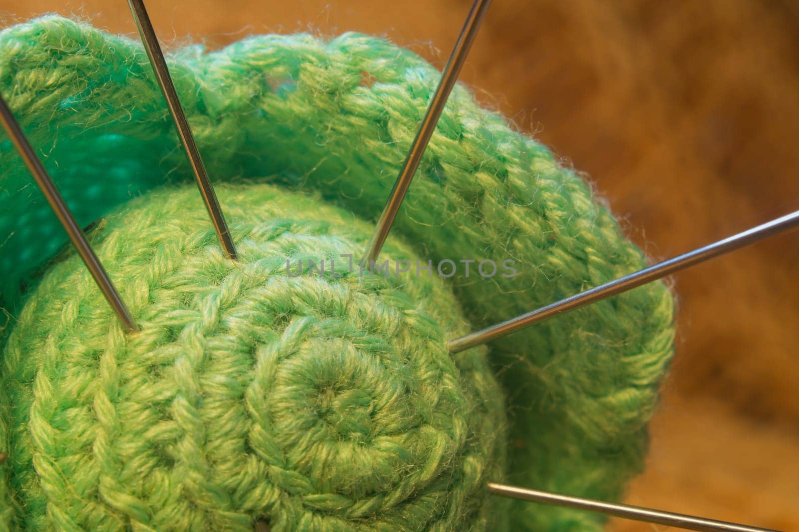 Handmade knitting wool texture background closeup needlework. healthy food concept