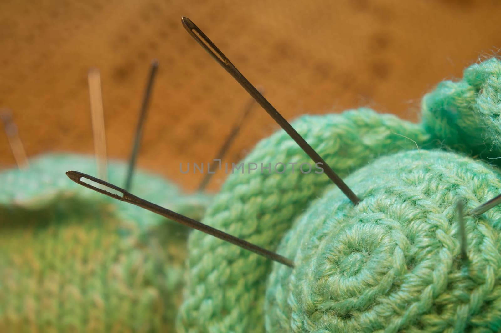 Handmade knitting wool texture background closeup needlework. healthy food concept