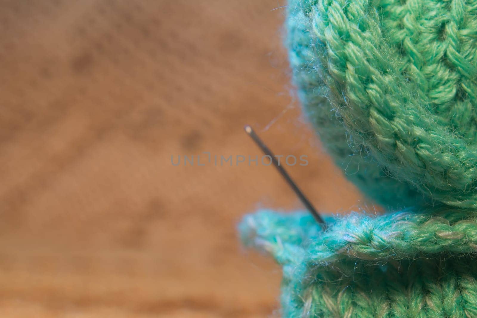 Handmade knitting wool texture background closeup needlework. healthy food concept