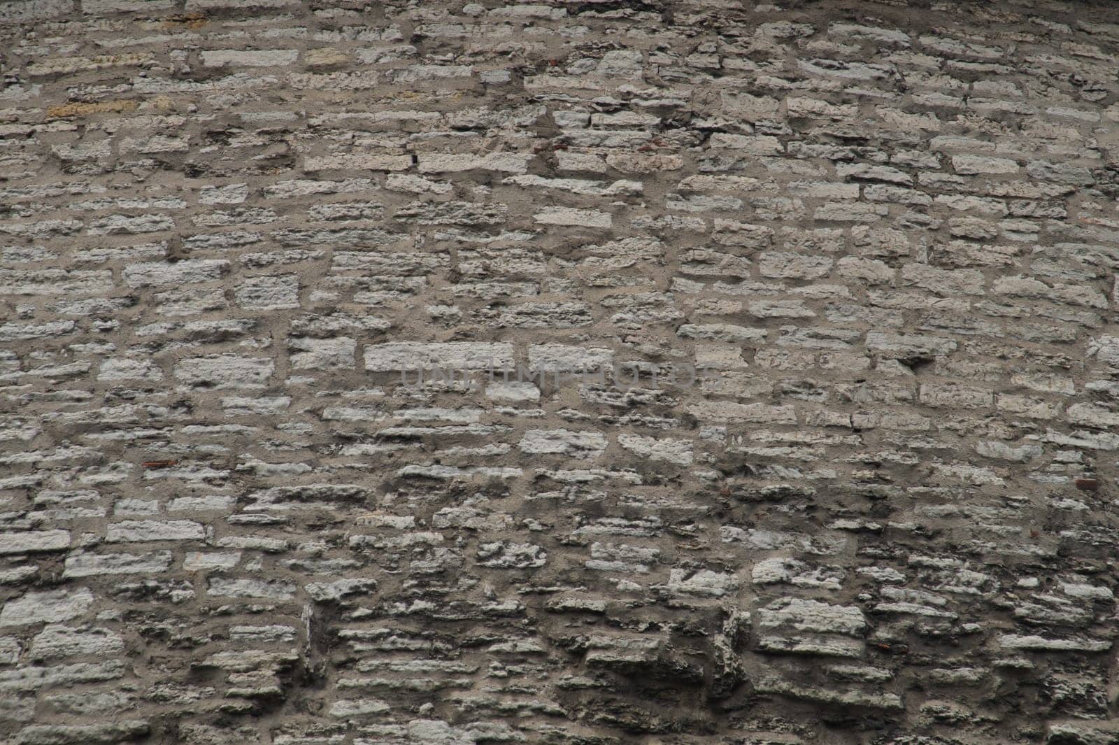 Old stone wall masonry texture background
