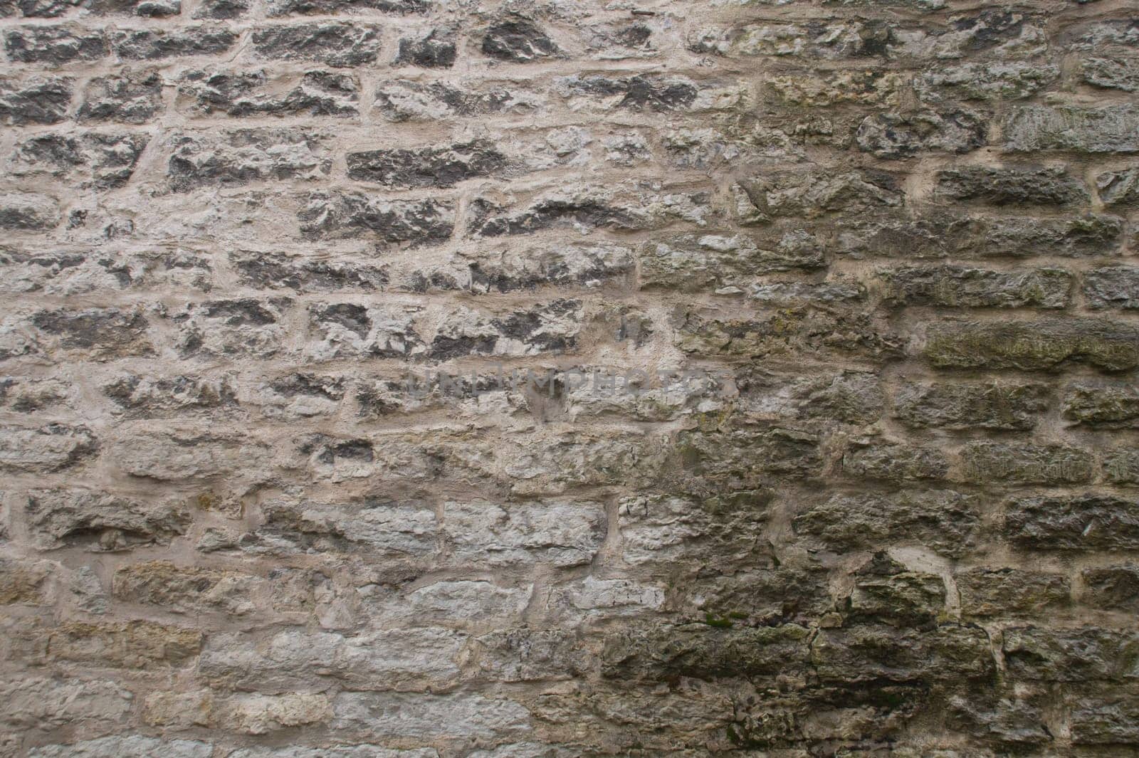 Old stone wall masonry texture background