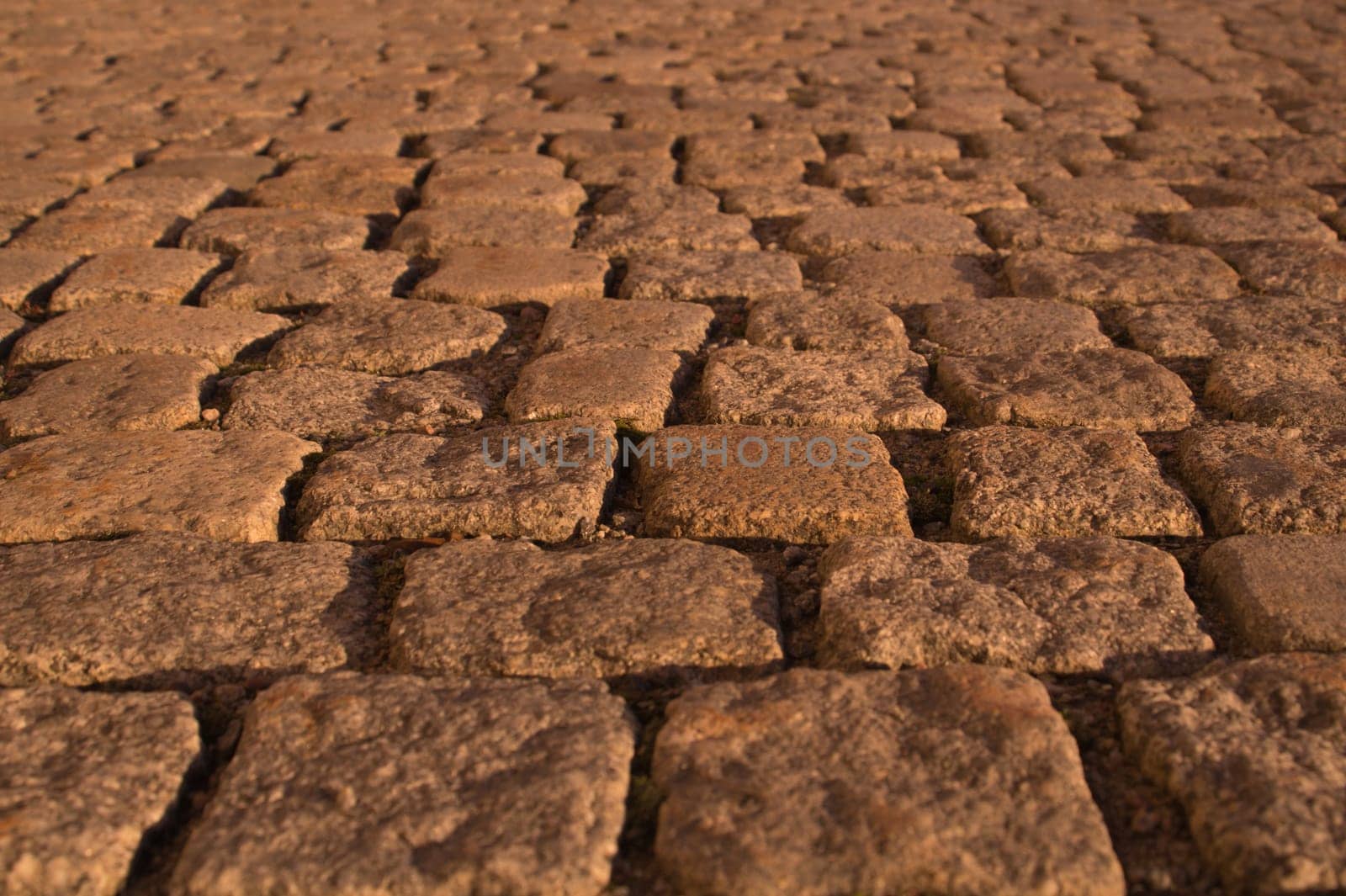 Stone pavement texture. cobblestone background