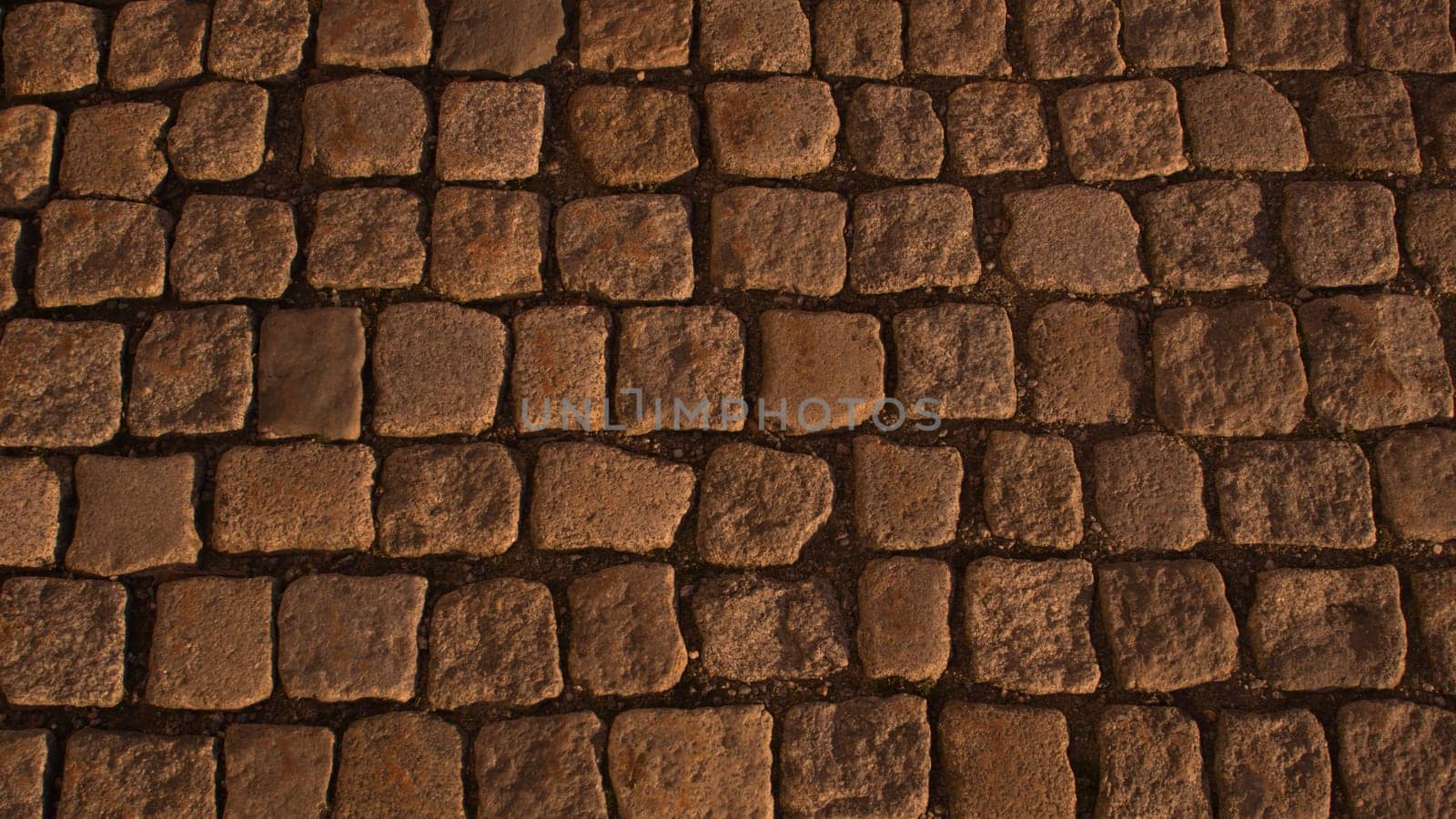 Stone pavement texture. cobblestone background