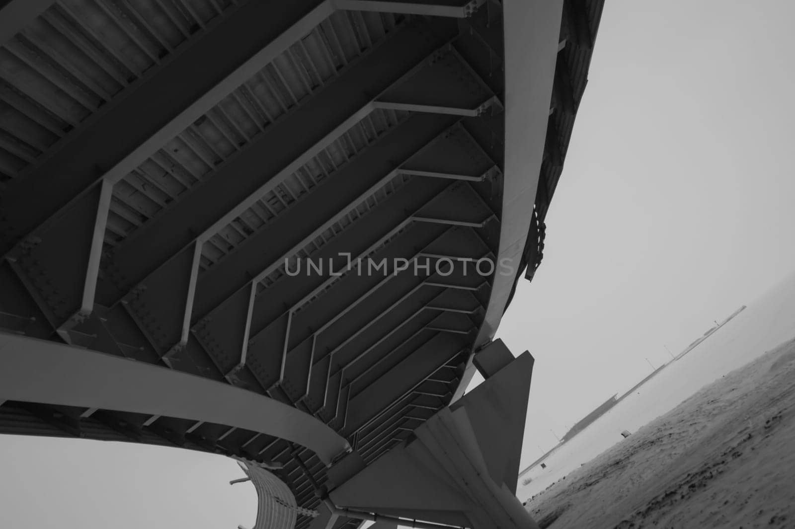 Architecture lines under the bridge. Speedway black and white