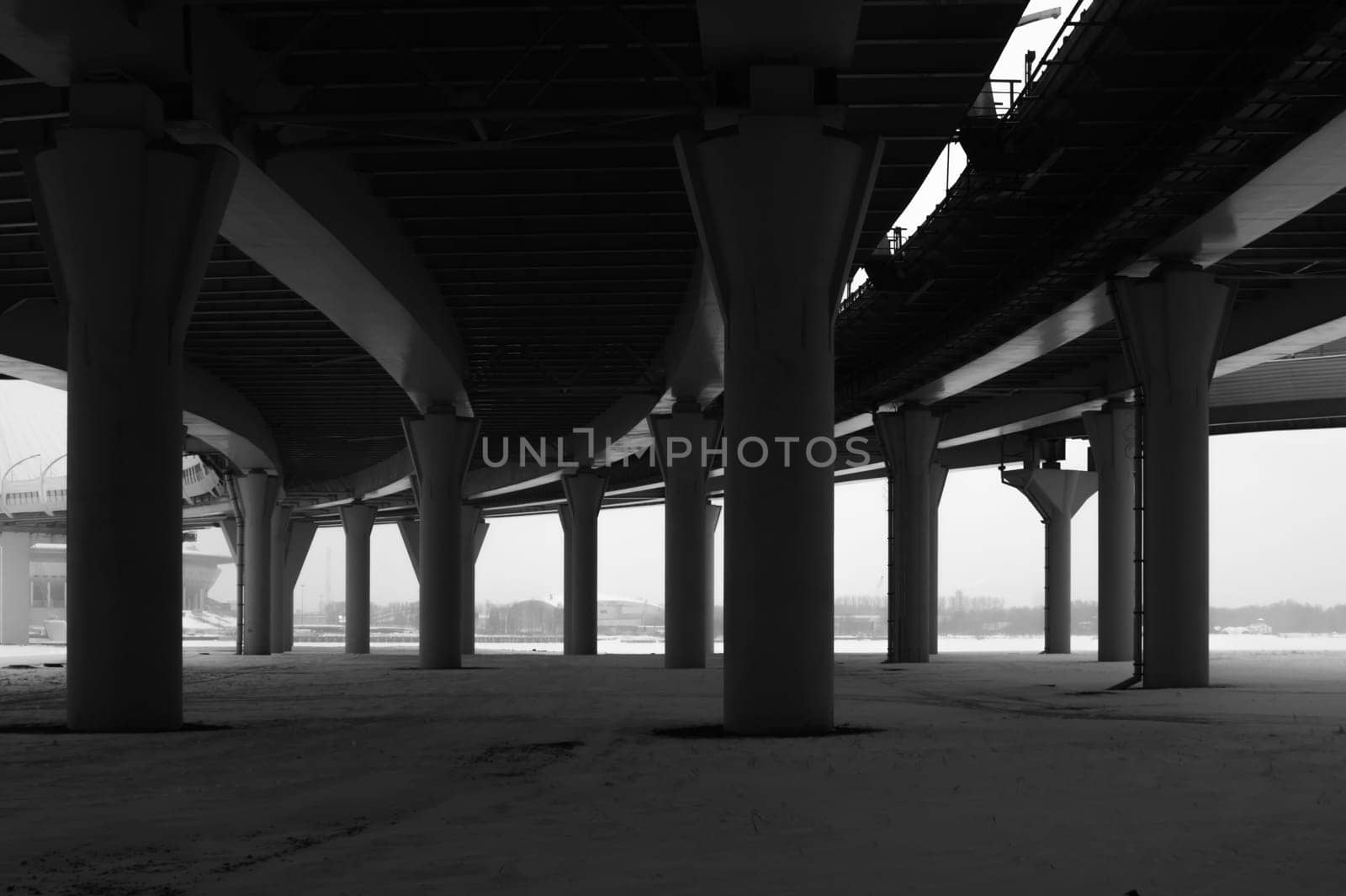 Architecture lines under the bridge. Speedway black and white