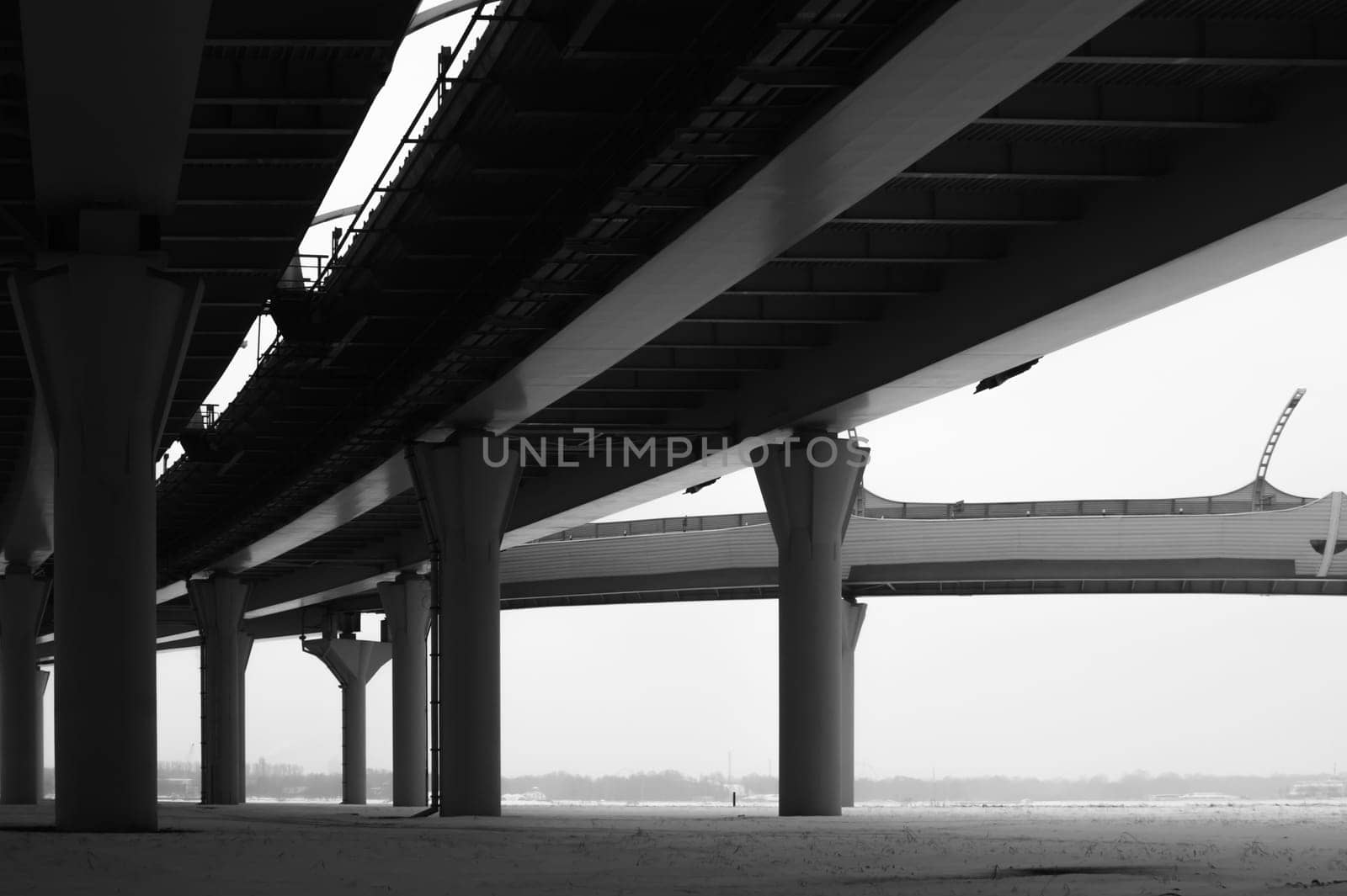 Architecture lines under the bridge. Speedway black and white