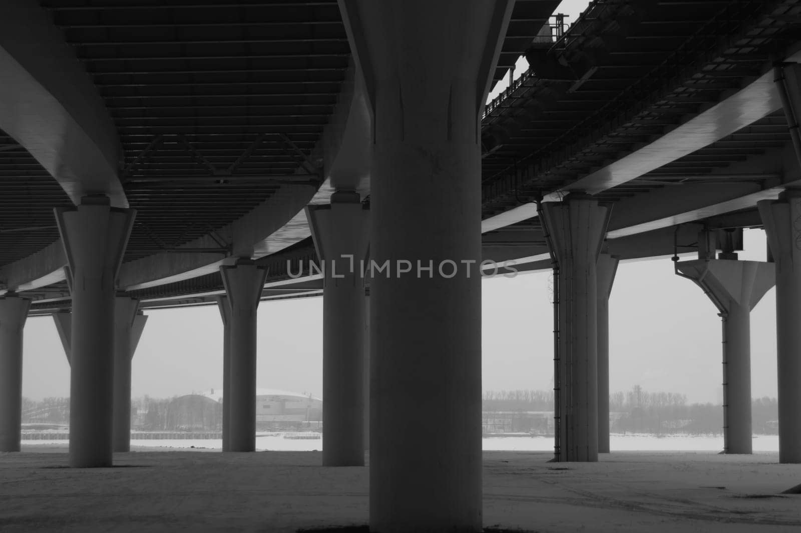 Architecture lines under the bridge. Speedway black and white