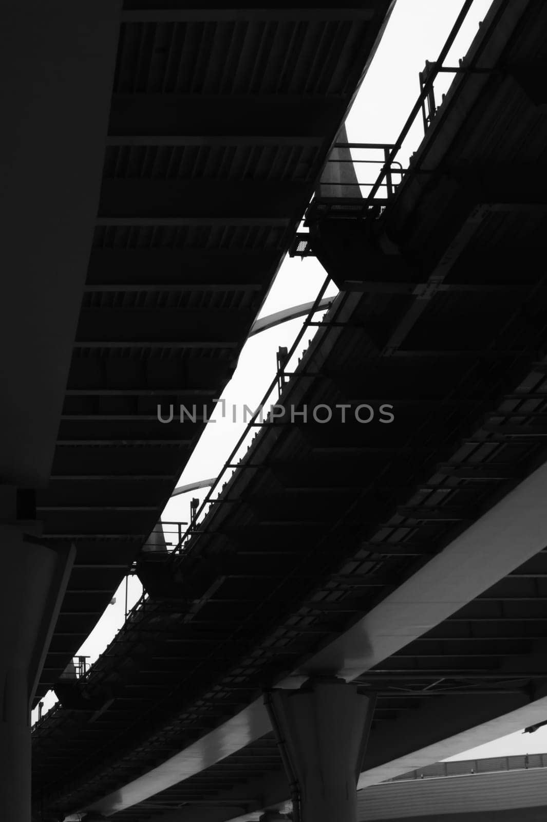 Architecture lines under the bridge. Speedway black and white