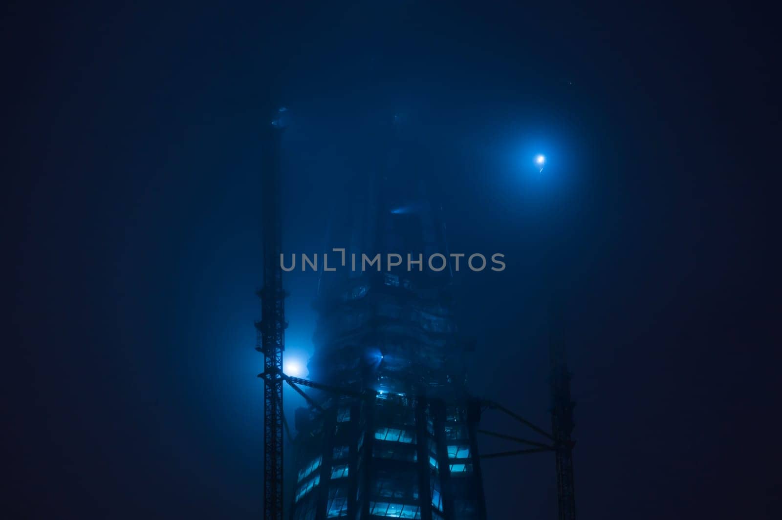 Skyscraper construction at nicht background