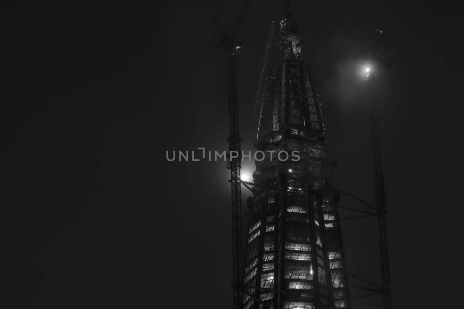 Skyscraper construction at nicht background