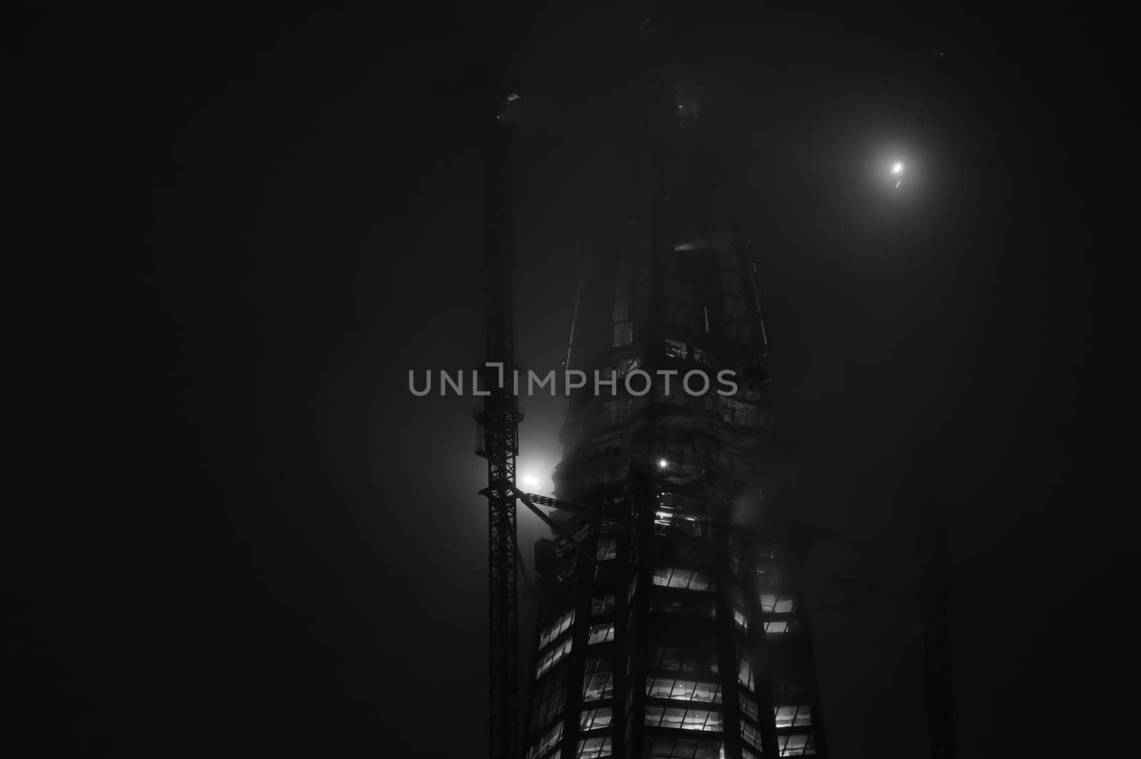 Skyscraper construction at nicht background